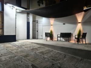 Un patio o zona al aire libre en Hermosa casa de 3 recámaras y 4 camas wifi y frente a balneario