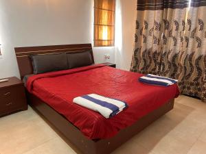 Postel nebo postele na pokoji v ubytování Marvella 3BHK Luxury Villa with Shared Pool + 9 fotografií