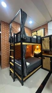 a room with two bunk beds in a building at Koh Tao Silver Na’s Hostel in Ko Tao +119 photos