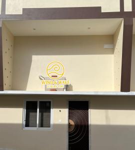 Un certificat, premiu, logo sau alt document afișat la Wind and Wave Resorts and Luxury Rooms Near Pondy and Auroville