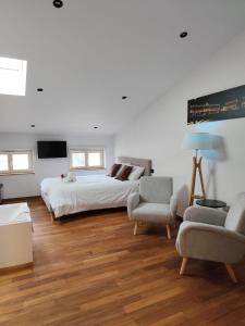 Ένα ή περισσότερα κρεβάτια σε δωμάτιο στο L escapade de Stan