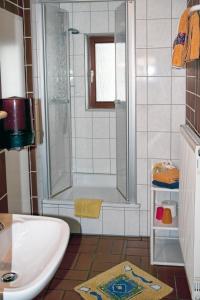 
Ein Badezimmer in der Unterkunft Hotel & Restaurant Zum Postillion
