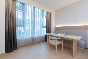 Khu vực ghế ngồi tại Ji Hotel Wuhan Wuhuan Sports Center