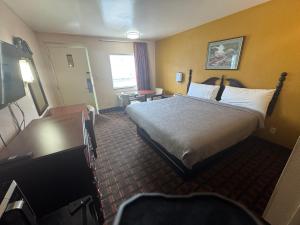 Una cama o camas en una habitación de Travel inn 16 fotos más