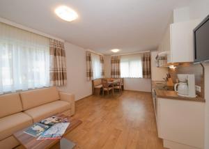 Kuchnia lub aneks kuchenny w obiekcie Apart Alexandra