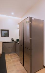 Η κουζίνα ή μικρή κουζίνα στο Adalie Pleiku Hotel