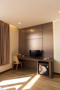 Μια τηλεόραση ή/και κέντρο ψυχαγωγίας στο Adalie Pleiku Hotel