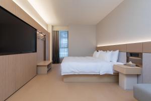 TV/trung tâm giải trí tại Ji Hotel Wuhan Wuhuan Sports Center