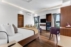 Kuchyň nebo kuchyňský kout v ubytování SinQ Symbol