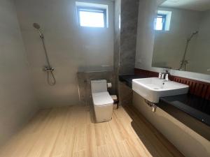 Ένα μπάνιο στο J&P Hotel Sriracha