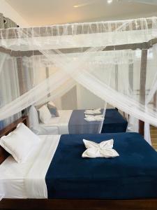 Ένα ή περισσότερα κρεβάτια σε δωμάτιο στο sun mount adams peak