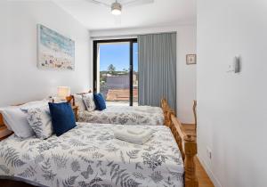 Ένα ή περισσότερα κρεβάτια σε δωμάτιο στο Beachside - Werri Beach