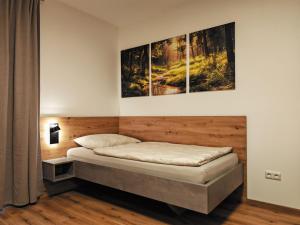 Ένα ή περισσότερα κρεβάτια σε δωμάτιο στο Pani's Gästezimmer