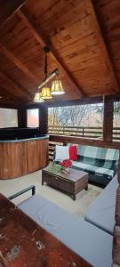 Posezení v ubytování Casa AyA Colibita