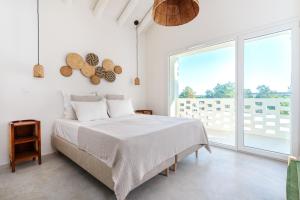 Ένα ή περισσότερα κρεβάτια σε δωμάτιο στο La Réserve-Comporta by Terresens +148 φωτογραφίες