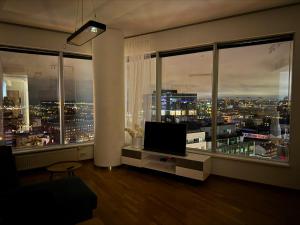 Et tv og/eller underholdning på Panoramic Sea View - 12th floor