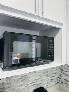 Η κουζίνα ή μικρή κουζίνα στο El Yunque Cabin House Private Pool River