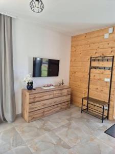 En eller flere senge i et værelse på Domek Pod Babim Szczytem + 22 billeder