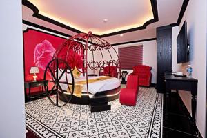 Ένα ή περισσότερα κρεβάτια σε δωμάτιο στο Royal Hotel Hồ Chí Minh +18 φωτογραφίες