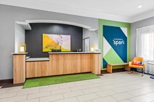 a rendering of a waiting area in a hotel lobby at Spark by Hilton La Grange in La Grange +26 photos