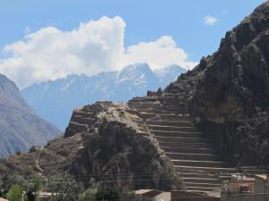a set of stairs on the side of a mountain at Tumy house B&B in Ollantaytambo