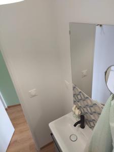 Кровать или кровати в номере Appartement calme neuf équipé