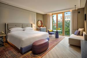 Ένα ή περισσότερα κρεβάτια σε δωμάτιο στο Fairmont Hanoi