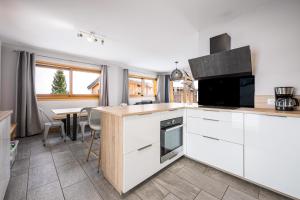 Køkken eller tekøkken på La Suite Du Skilodge