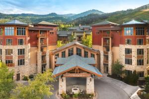 an aerial view of a building with mountains in the background at Hilton Grand Vacations Club Sunrise Lodge Park City in Park City