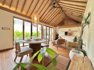 Телевизор и/или развлекательный центр в BoBos Villa Echo