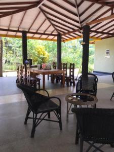 a group of chairs and a table and a table and chairs at Wewlekam Safari Resort 