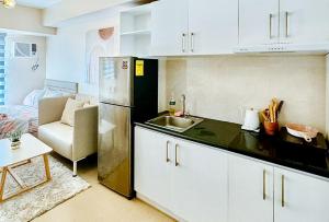Kuchyň nebo kuchyňský kout v ubytování Avida Towers Atria by RedDoorz + 5 fotografií