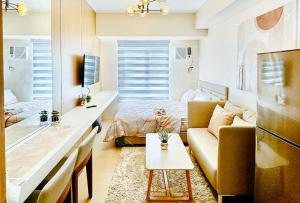 Posezení v ubytování Avida Towers Atria by RedDoorz