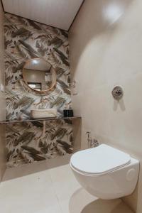 Ванная комната в Kaustubh farm by Classy stay