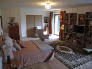 Ένα ή περισσότερα κρεβάτια σε δωμάτιο στο La Béraine "rien que pour vous"