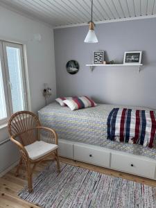 Postel nebo postele na pokoji v ubytování Villa Mellalampi