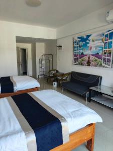 Postel nebo postele na pokoji v ubytování 海鑫宾馆