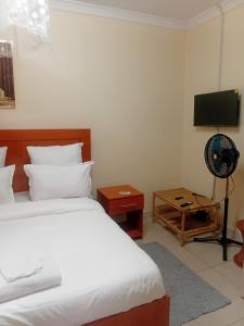 Ένα ή περισσότερα κρεβάτια σε δωμάτιο στο My home suites area14