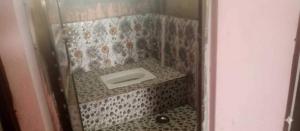 a small bathroom with a sink in the corner at SPOT ON Pawan Restaurant & Dhabha in Phāphāmau