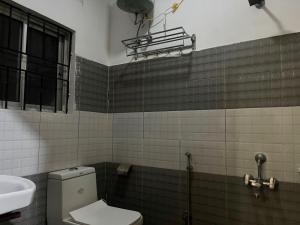 Ένα μπάνιο στο Hotel O BAHINI