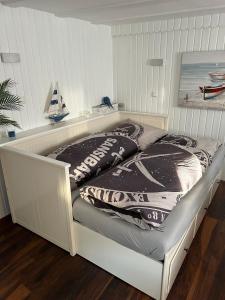 Ένα ή περισσότερα κρεβάτια σε δωμάτιο στο Apartment mit Sauna und Terrasse