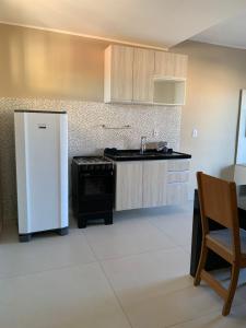 Η κουζίνα ή μικρή κουζίνα στο ALIZE CUMBUCO