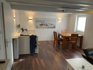 Η κουζίνα ή μικρή κουζίνα στο Apartment mit Sauna und Terrasse +19 φωτογραφίες