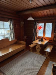 Posezení v ubytování Villa Mellalampi