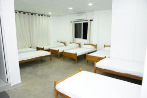 Ένα ή περισσότερα κρεβάτια σε δωμάτιο στο Colombo Mount Hostel +1 φωτογραφίες