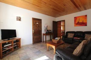 Μια τηλεόραση ή/και κέντρο ψυχαγωγίας στο Chambre Les Embruns, Le Petit Ruban