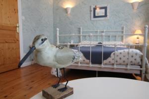 Ένα ή περισσότερα κρεβάτια σε δωμάτιο στο Chambre Les Embruns, Le Petit Ruban