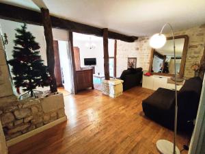 Χώρος καθιστικού στο Gîte des Trois Coeurs, 4-8pers, charme ancien et salle de jeux