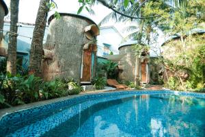Πισίνα στο ή κοντά στο Cocohut Hoi An Homestay