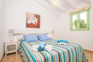 Postel nebo postele na pokoji v ubytování Sa Plana de Baix + 17 fotografií